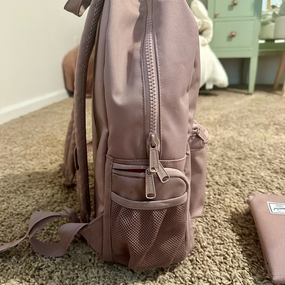 herschel backpack for baby Settlement Diaper Bag Supply Co. USA The Herschel Supply Nova Sprout Backpack in Ash Rose offers practical functionality for parents on the go with their infants Settlement Backpack Diaper Bag -